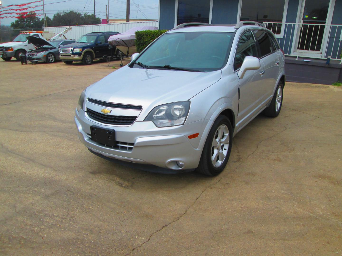 2015 SILVER Chevrolet Captiva Sport (3GNAL3EK1FS) , located at 1815 NE 28th St., Fort Worth, TX, 76106, (817) 625-6251, 32.795582, -97.333069 - Photo#0